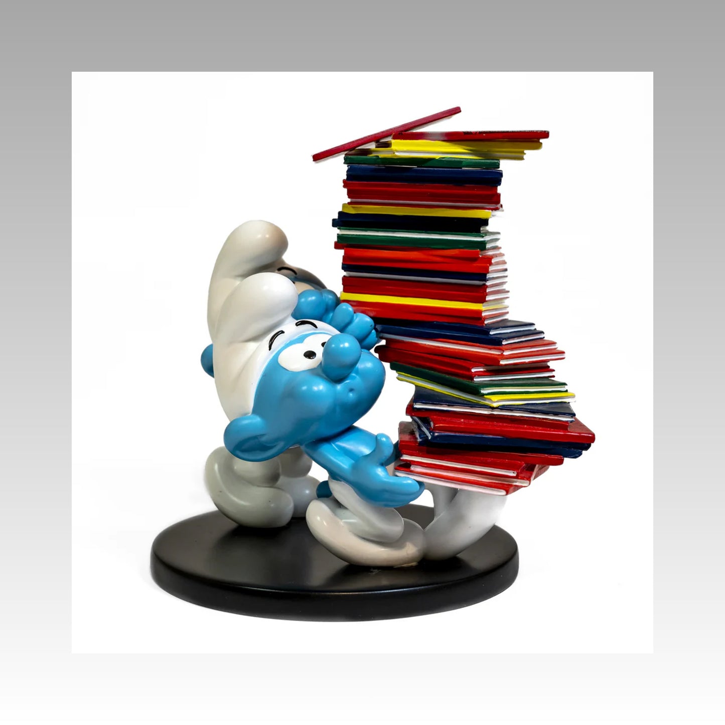 Figurine Schtroumpfs pile d'albums