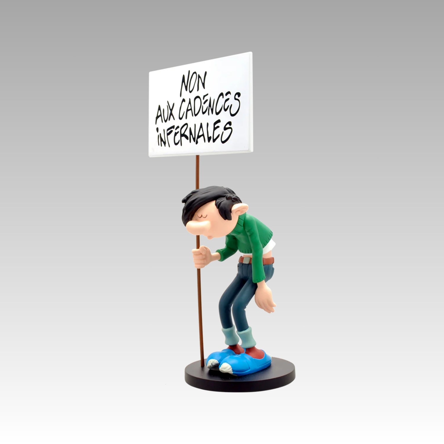 Figurine Gaston Lagaffe pancarte non aux cadences infernales