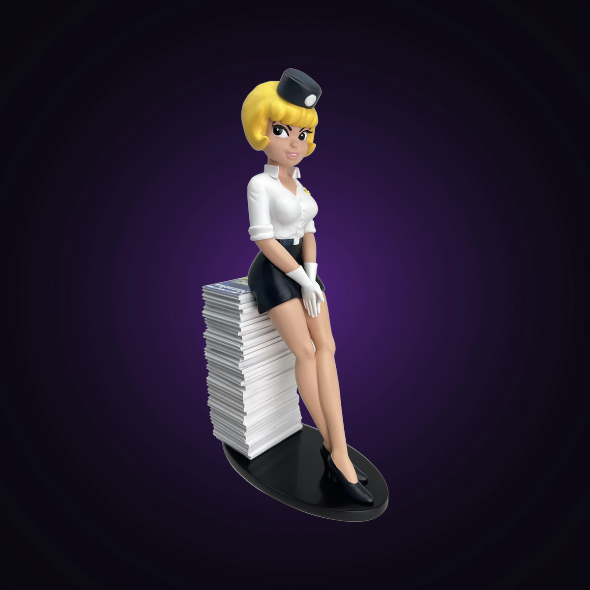 Figurine Natacha pile d'albums