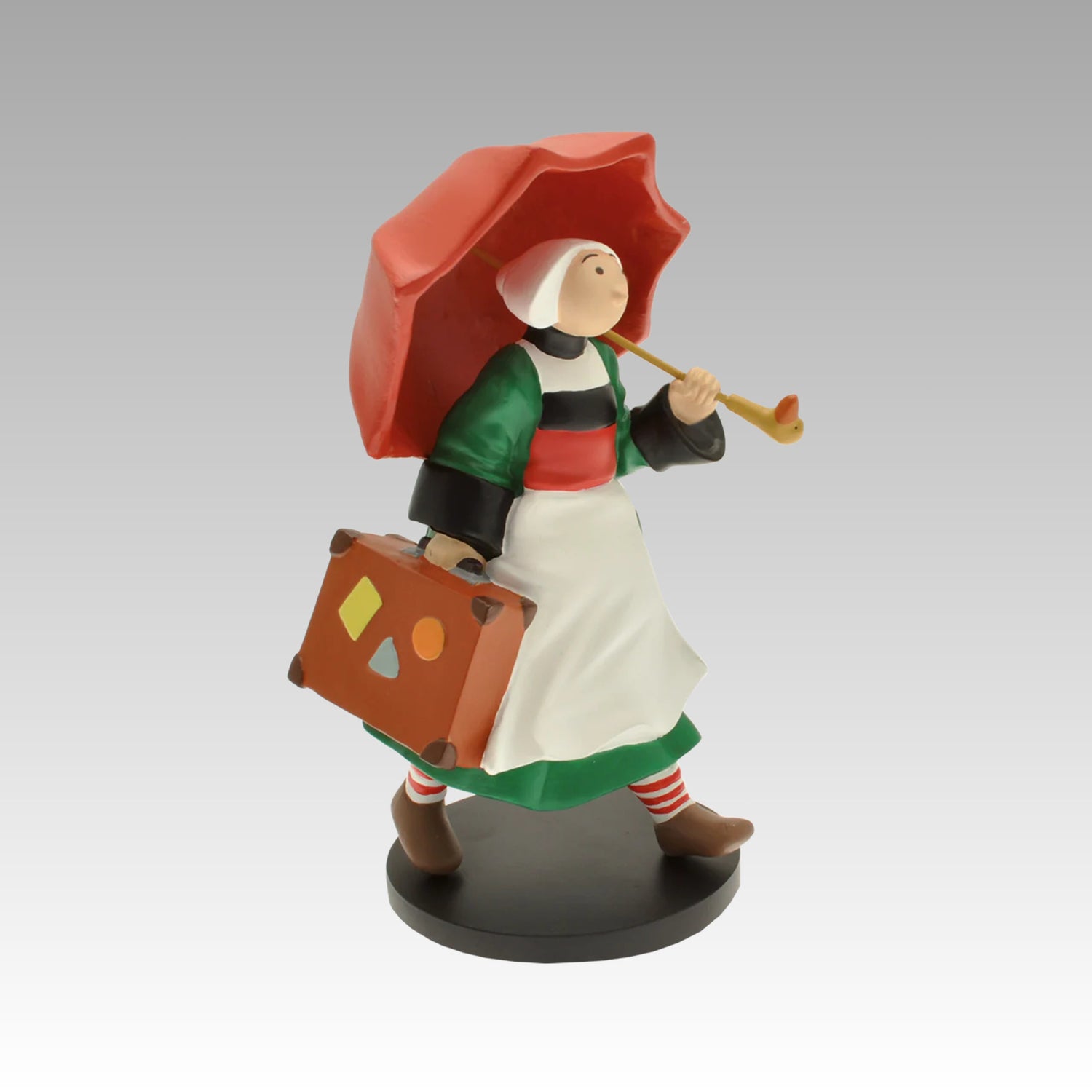 Figurine Bécassine et son parapluie