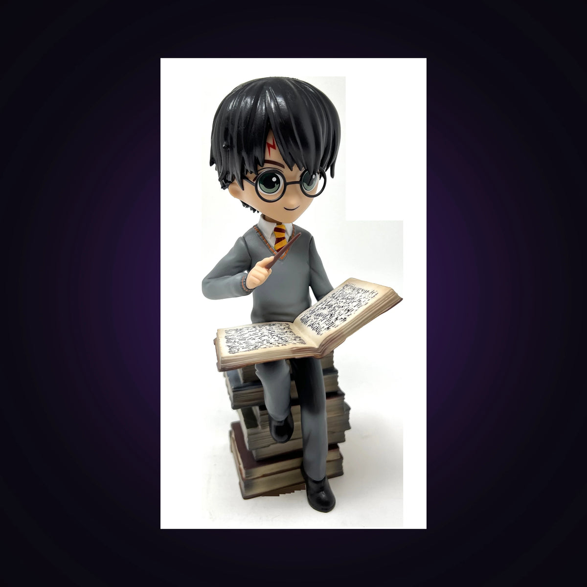 Figurine Harry Potter pile de grimoires