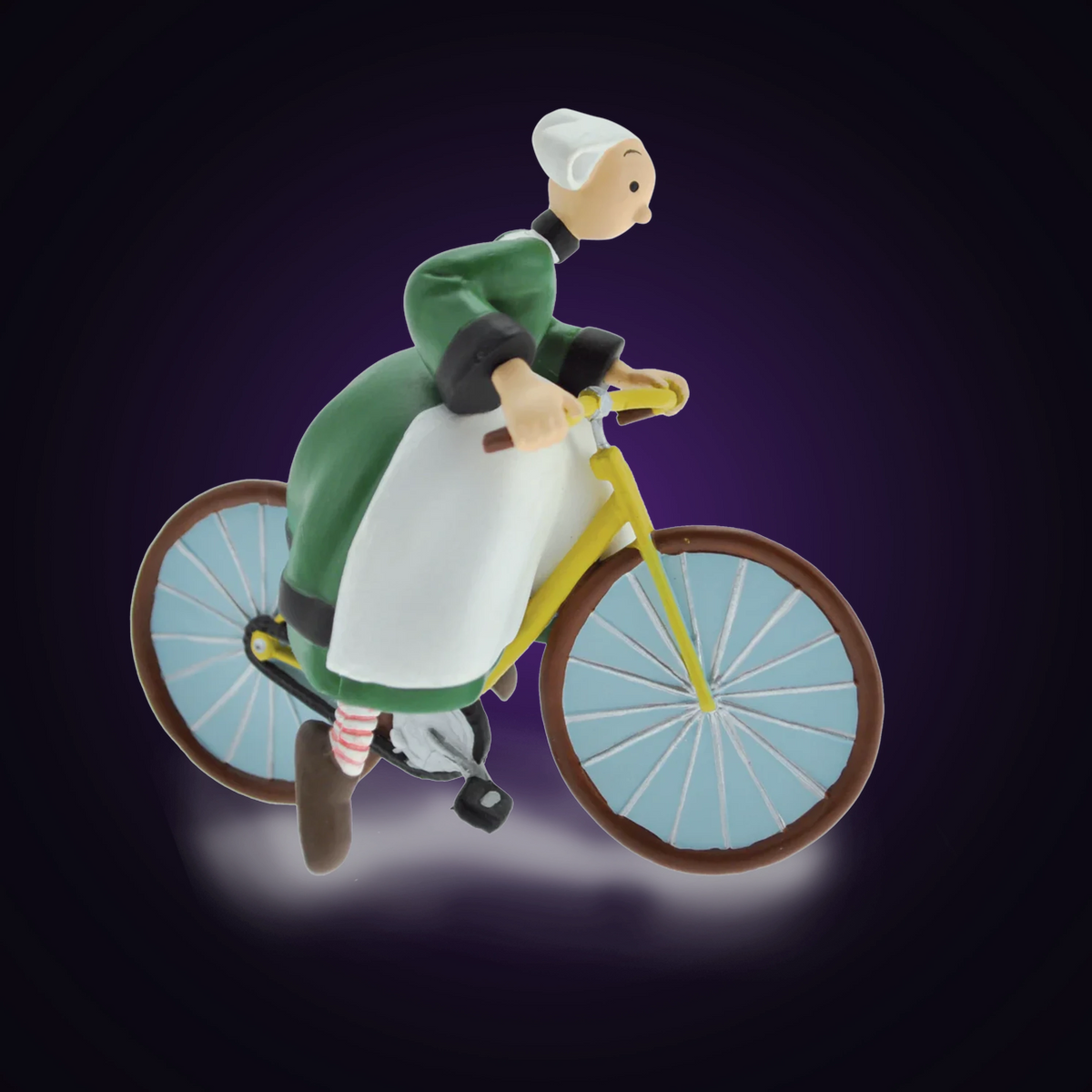 Figurine Bécassine à vélo