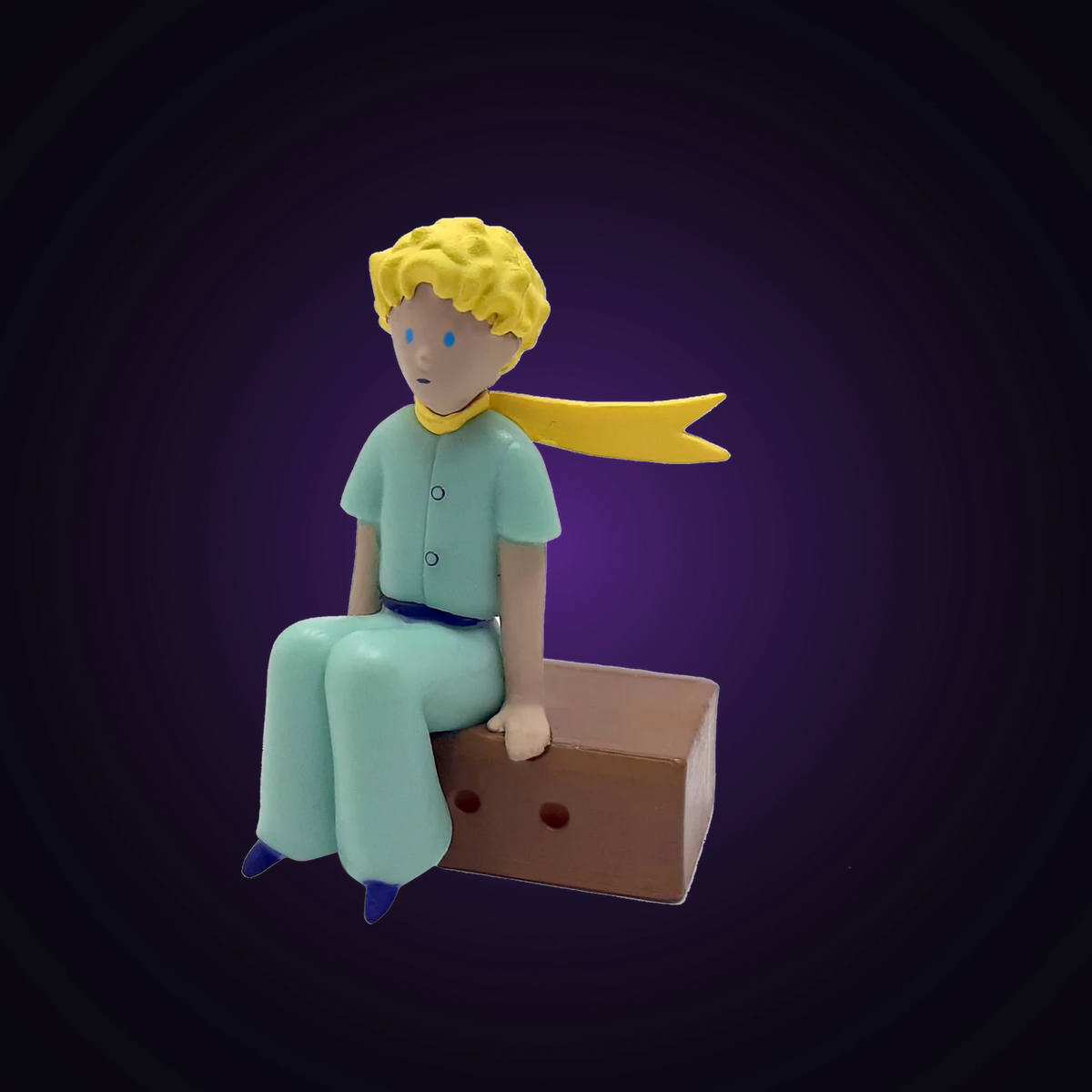 Figurine le Petit Prince sur sa caisse