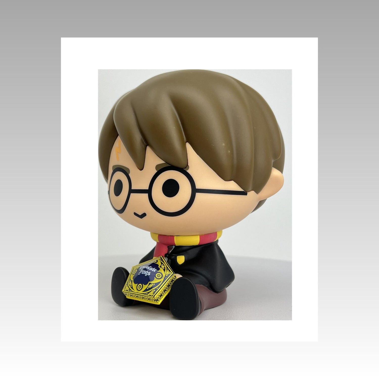 Tirelire Chibi Harry Potter et boîte de chocogrenouille